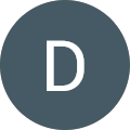 Dark circle with letter "D" in center.