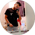 Man taking a mirror selfie at home.